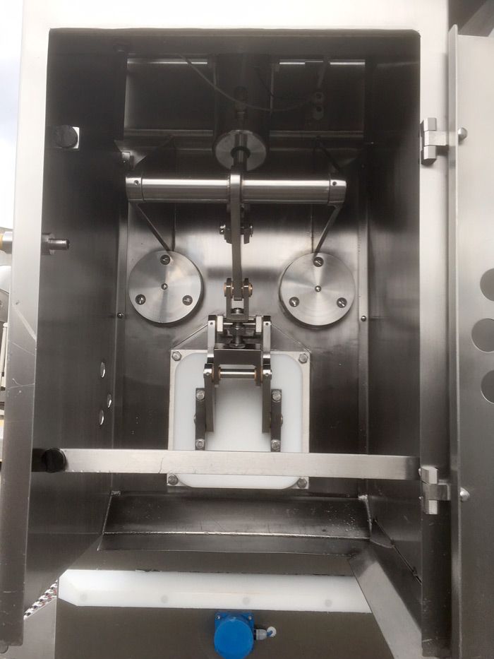 Laska MWM 1330 Grinder Mixer with Cooling Option and 200 Tote Bin Loader